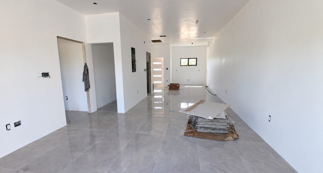 unfinished-modern-interior-with-glossy-tile-floors.jpeg