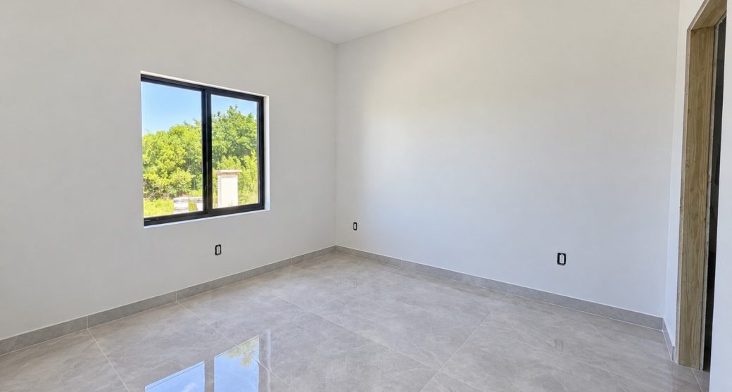 sunlit-modern-room-under-construction.jpeg