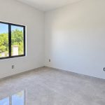 sunlit-modern-room-under-construction.jpeg